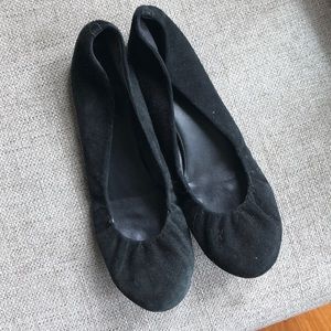 Black suede flats